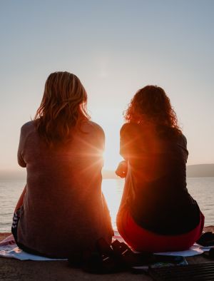 Two ladies watching the sunset