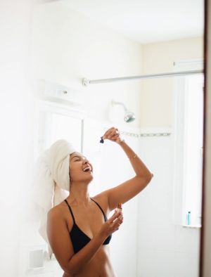 Woman taking CBD Oil | Cannaray CBD