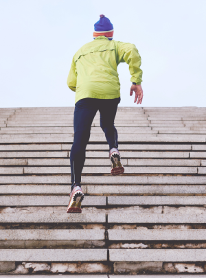 man running up stairs