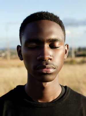 Man standing in sunlight