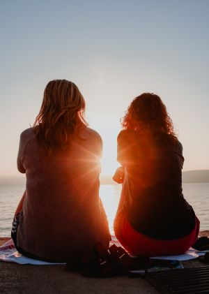 Two ladies watching the sunset