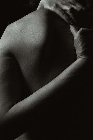 Man shoulder massage with CBD balm