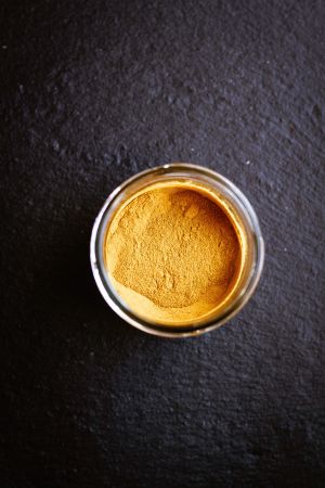 Pot of Curcumin Powder
