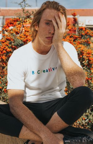 Man holding head in hand | CBD for Anxiety | Cannaray CBD