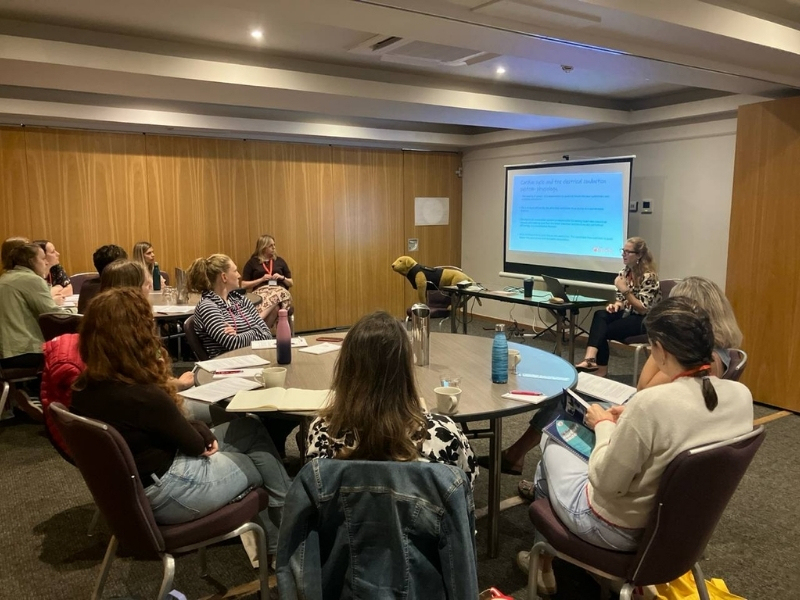 nurses sat around tables taking part in a lecture with HeartVets