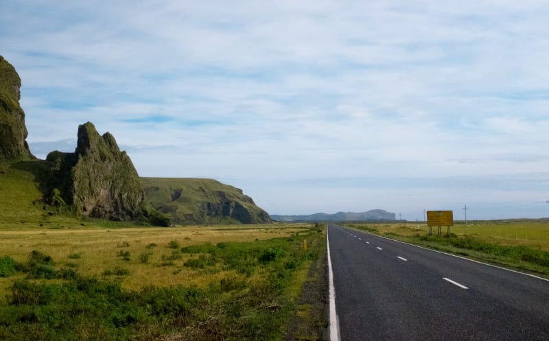 Image of a road in Iceland and a mountain