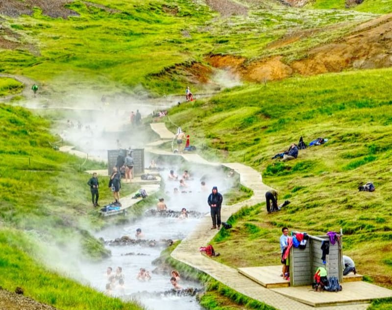 Image of people bathing in Reykjadalur Hot Spring Iceland