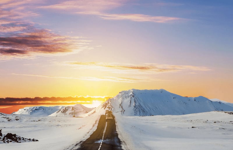 Image of a road in Iceland in winter time, beautiful sunny day.