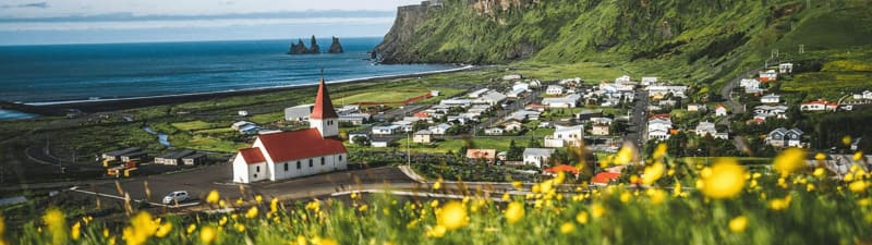 Image of a town in Iceland called Vik. Beautiful sunny day.