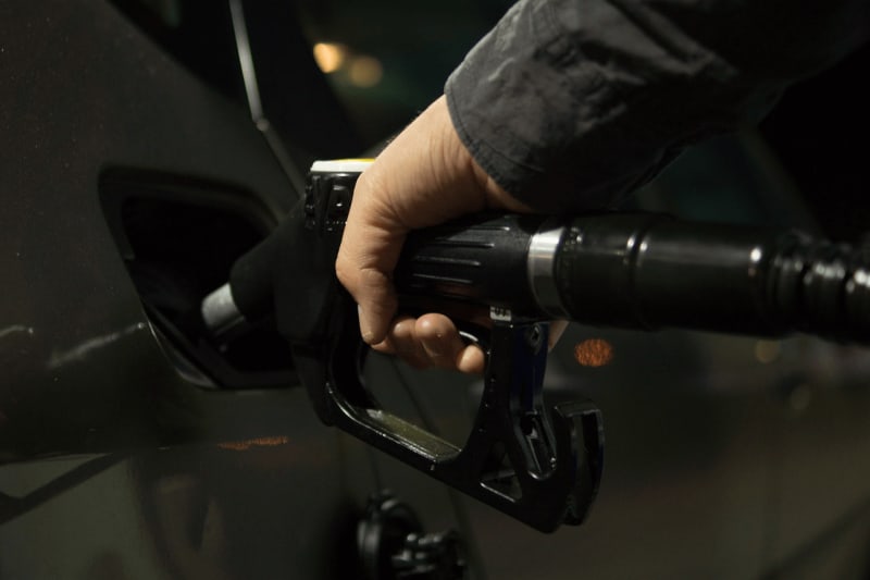 Image of a person pumping fuel