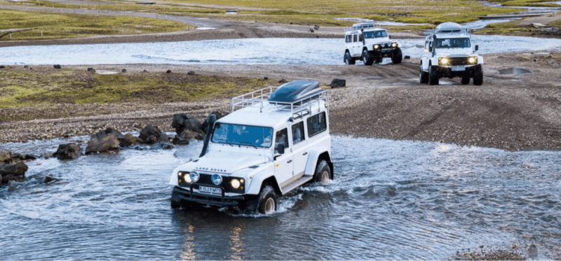 Image of an Iceland 4x4 Rental vehicle crossing a river due to its high ground clearance.