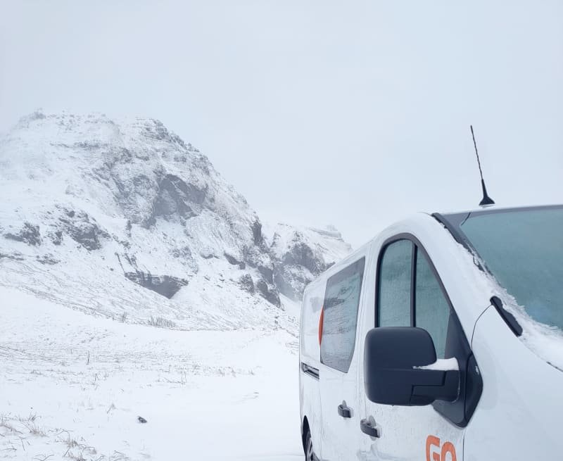 Image of a campervan rental in Iceland in the snow