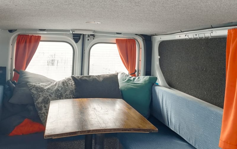 Image of the inside of a campervan parked in a campsite in Iceland