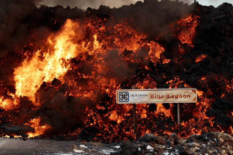 Image of a road sign for the Blue Lagoon under lava from the recent volcanic eruption in Iceland