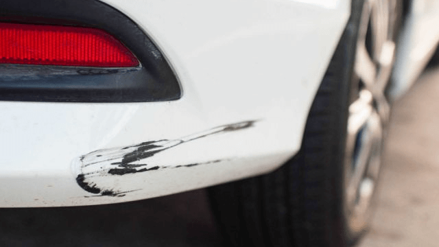 Image of a scratched rental vehicle