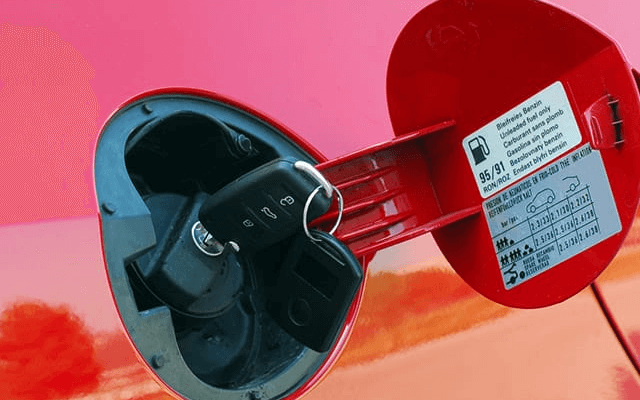 Fuel sticker on the fuel cap of a rental car