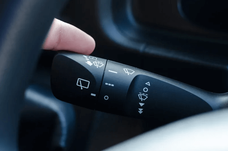 Image of a turn signal inside a car.