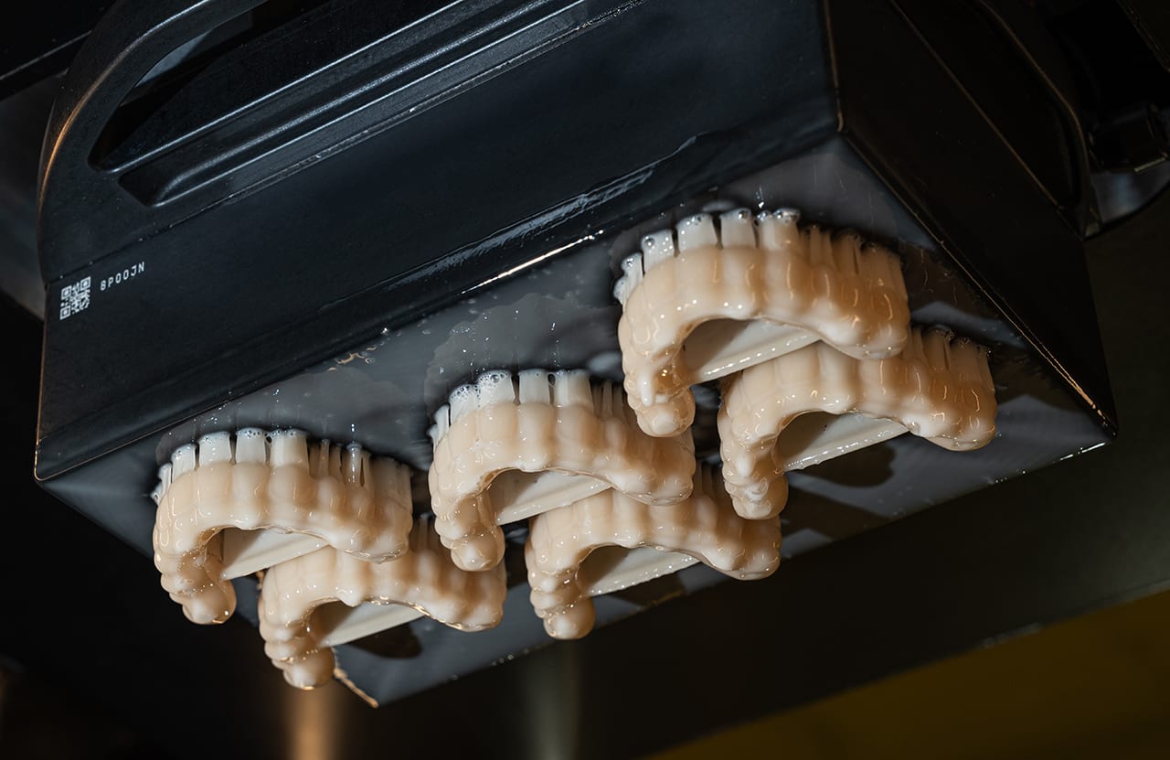 Pac-Dent Rodin Titan dentures on printer tray