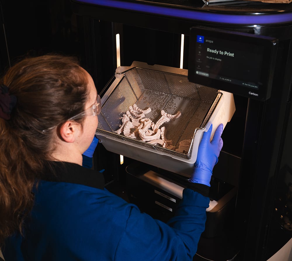 Lab Technician Sorting Parts