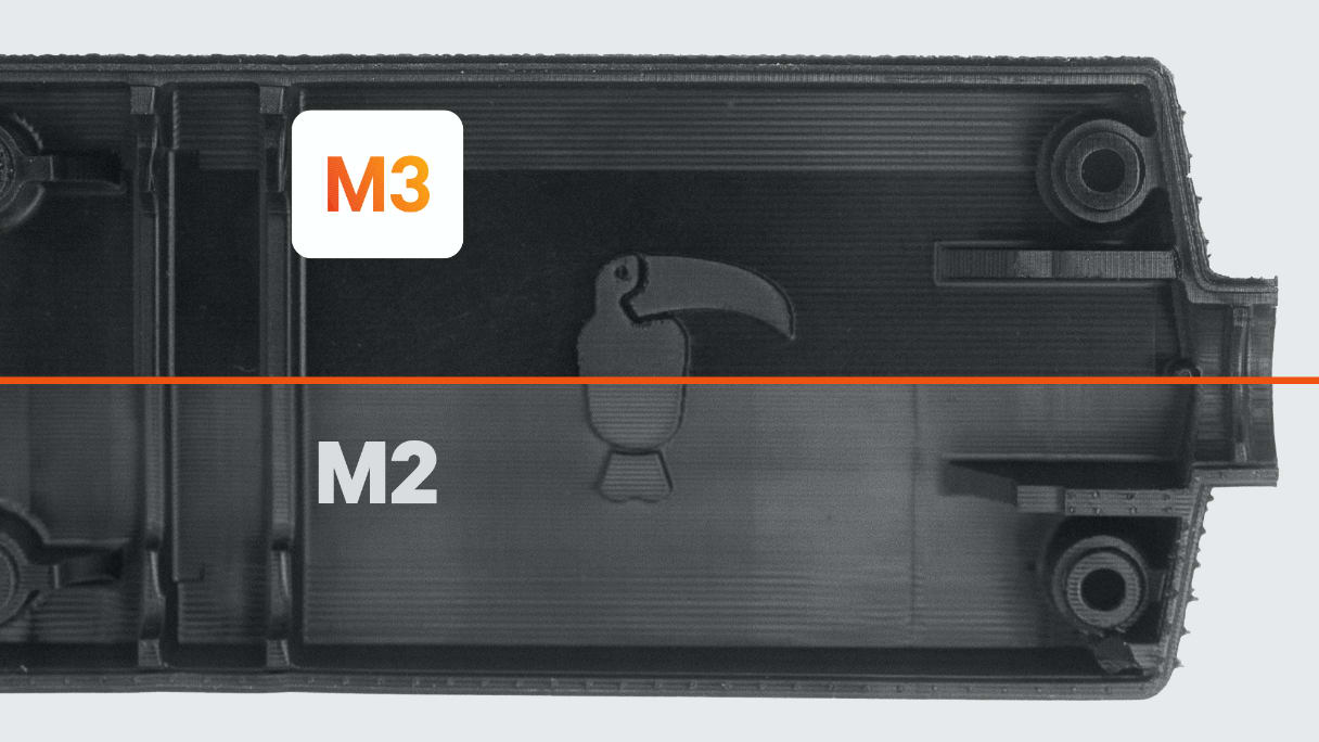 Two parts printed on an M3 and M2, to showcase the cleaner finish from M3