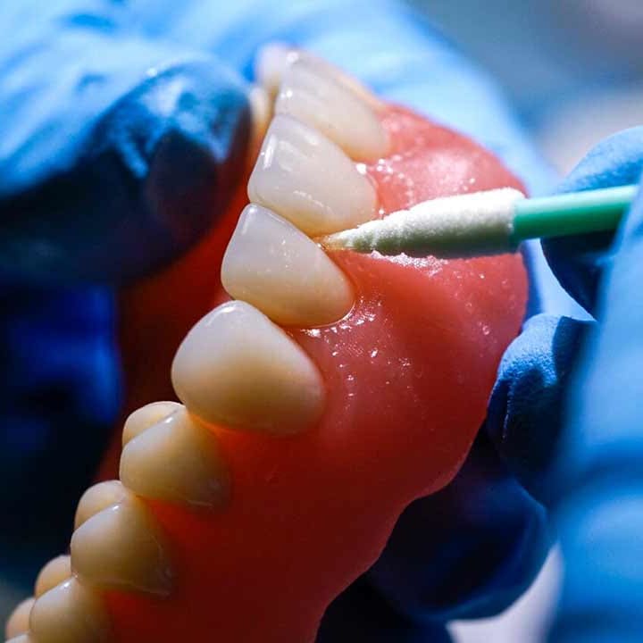 Cleaning a Bottom Denture
