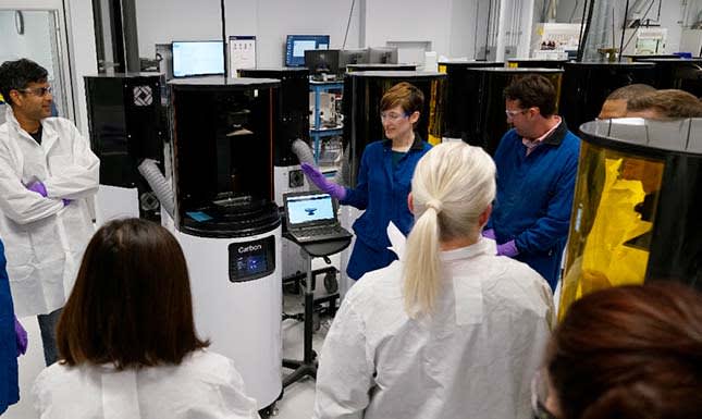 Technicians in the lab with Carbon printers