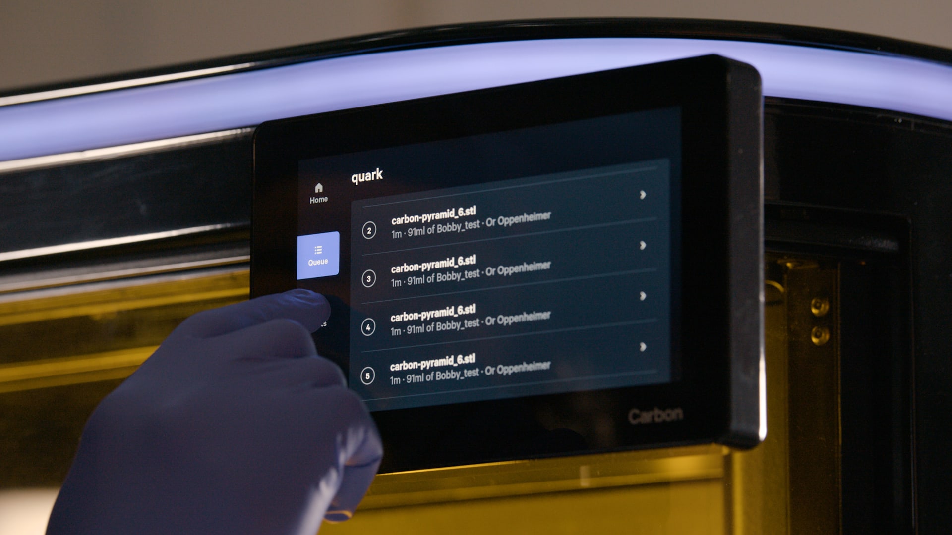 A close-up of the Carbon M3 printer showing the onboard user interface panel