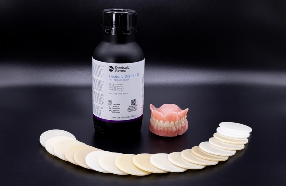2 Bottles of Lucitone and a Pair of Dentures
