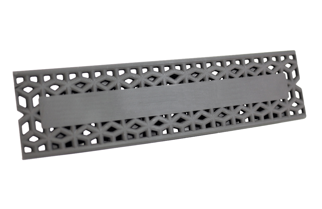 Flat surface on a name plate for text