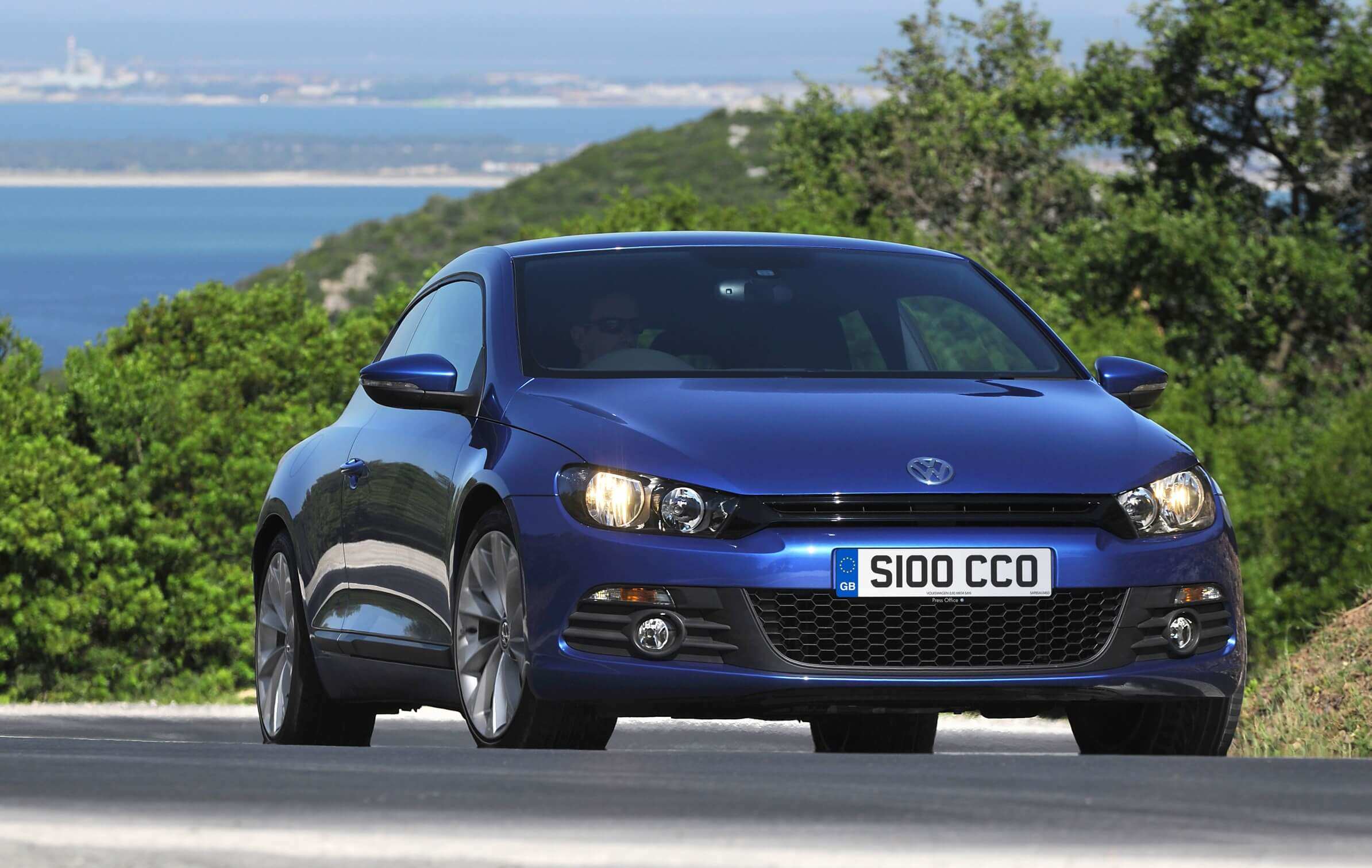 Blue Volkswagen Scirocco coupe