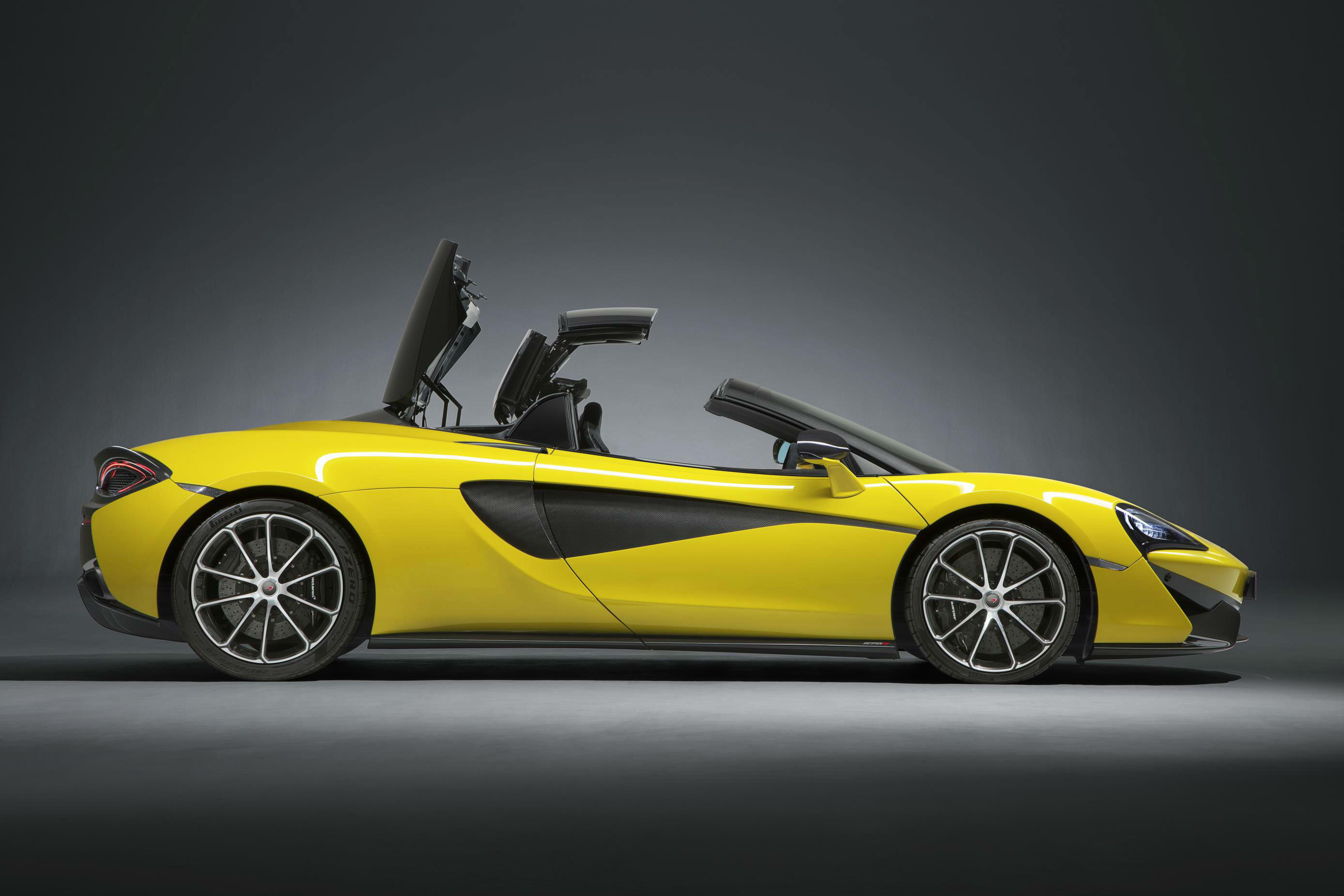 image of a yellow mclaren 570s spider convertible car