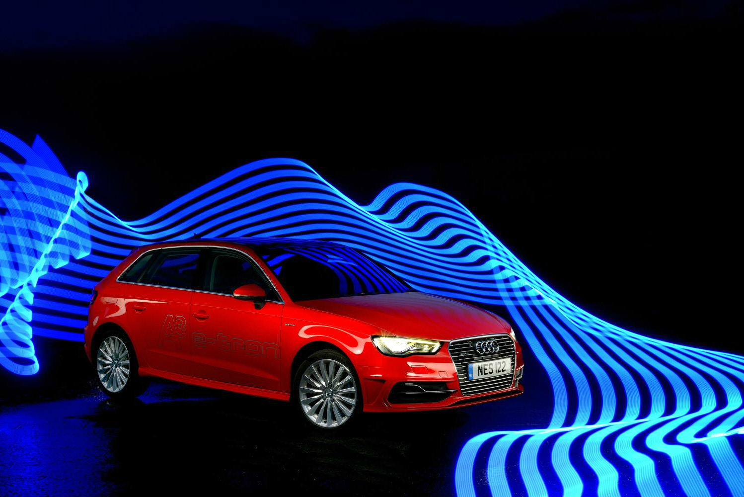 image of a red audi a3 etron plugin hybrid car exterior