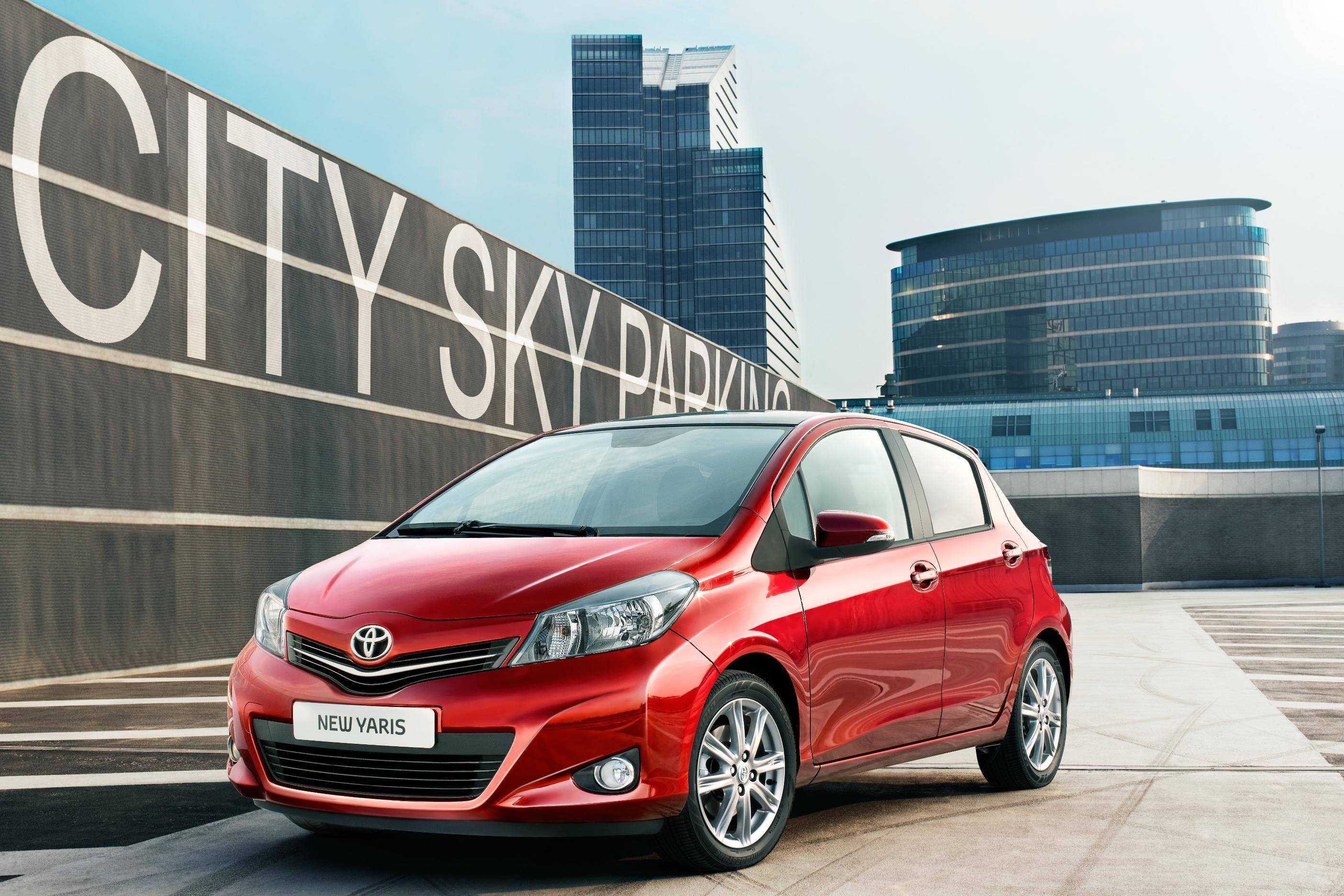 image of a red toyota yaris car exterior