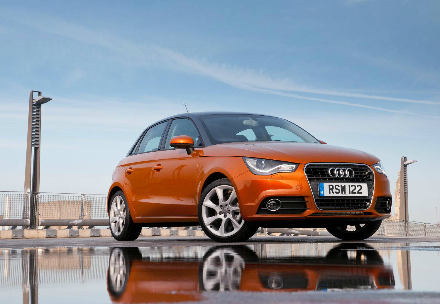 image of a orange audi a1 car exterior