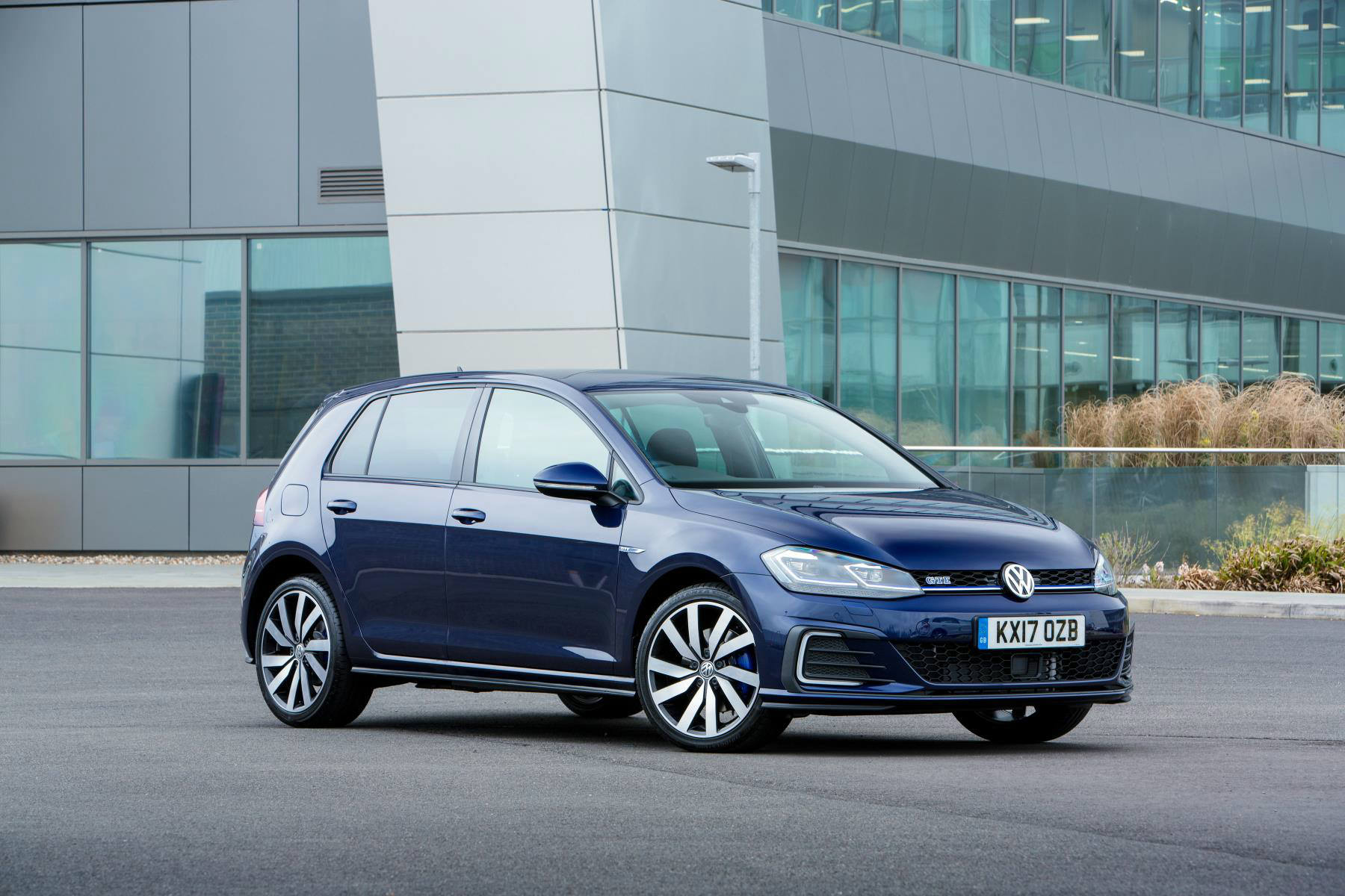 image of a blue volkswagen golf gte car exterior