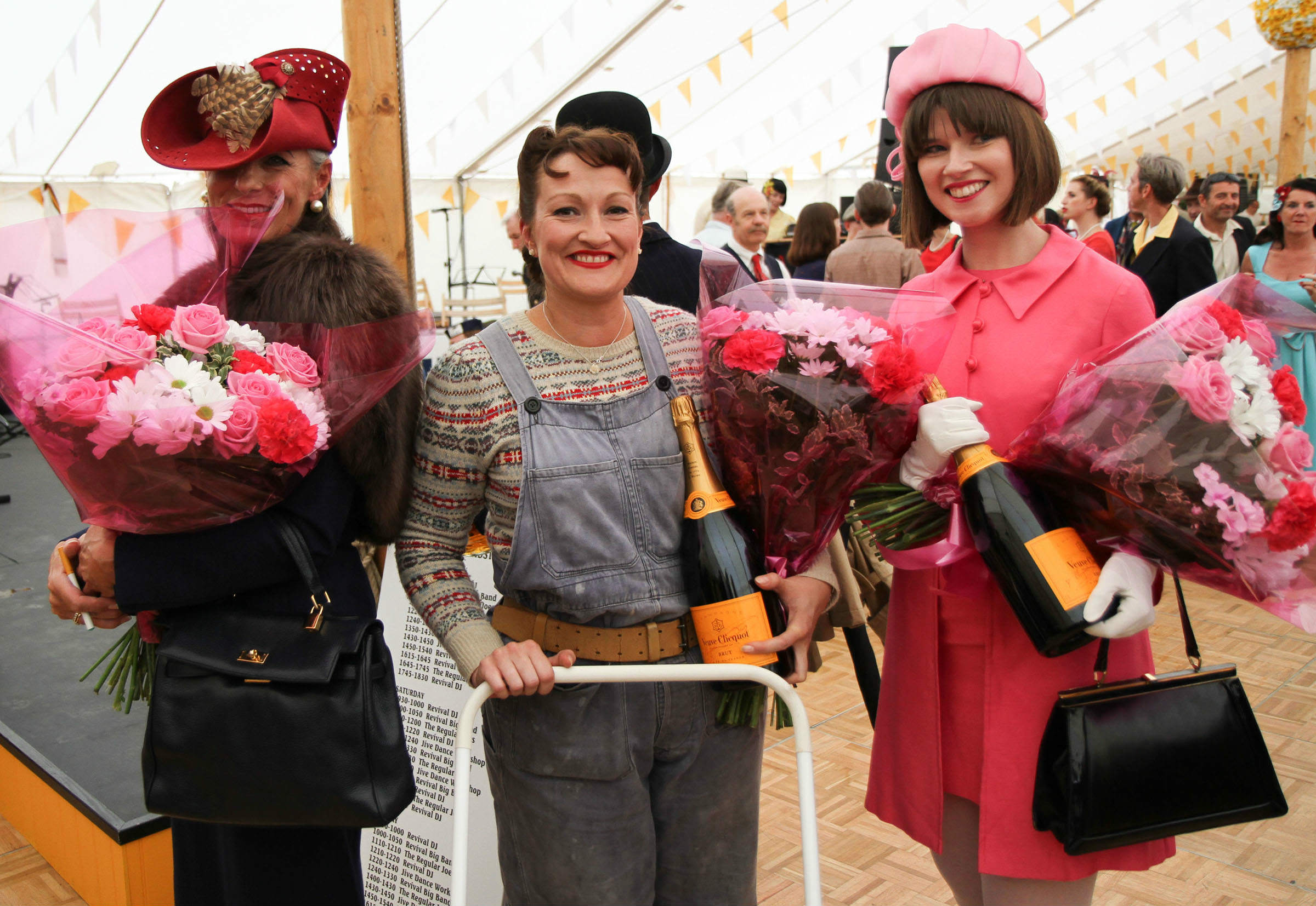 image of people dressed up in vintage clothing at goodwood revival festival 2017