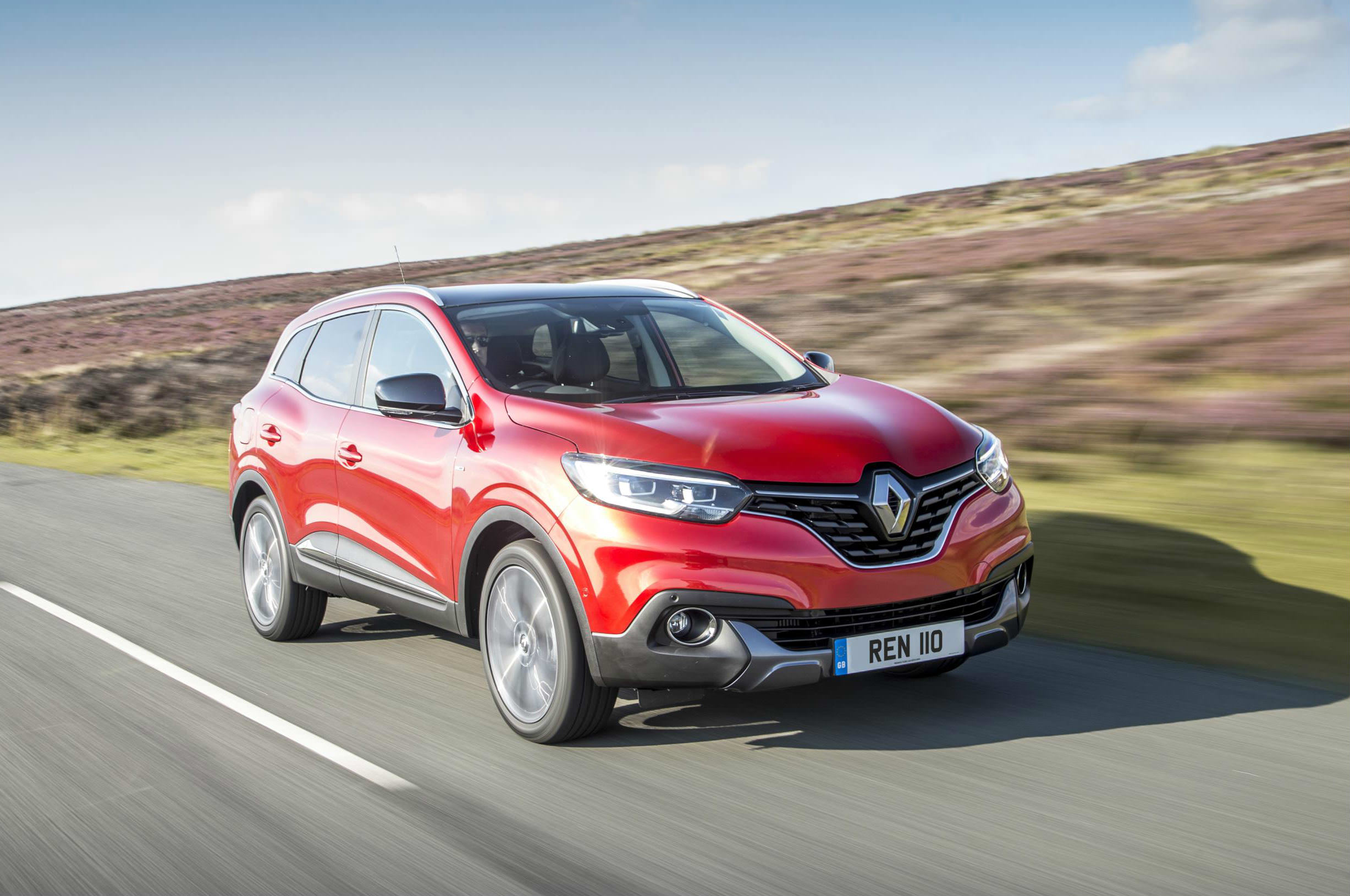 image of a renault car on a country road