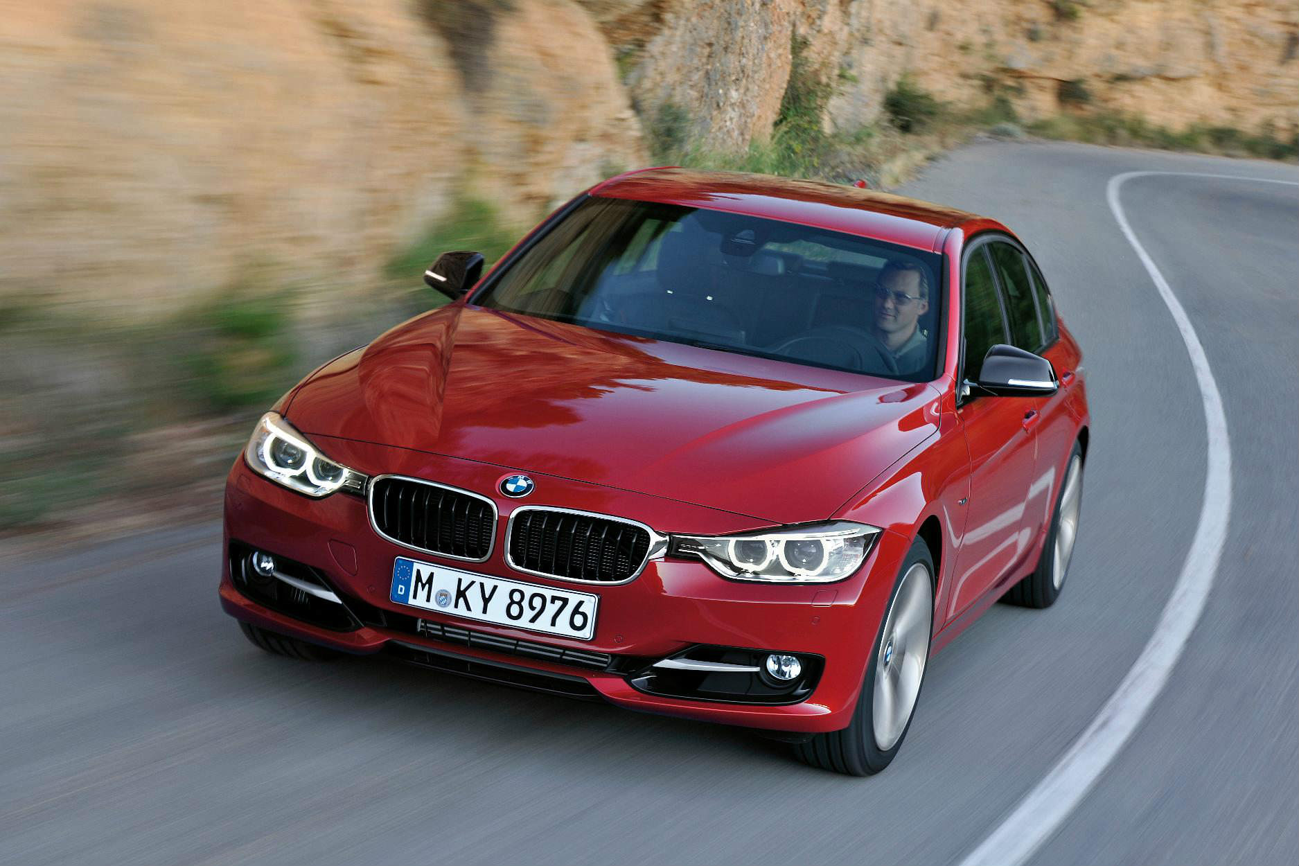 image of a red bmw 3 series car exterior