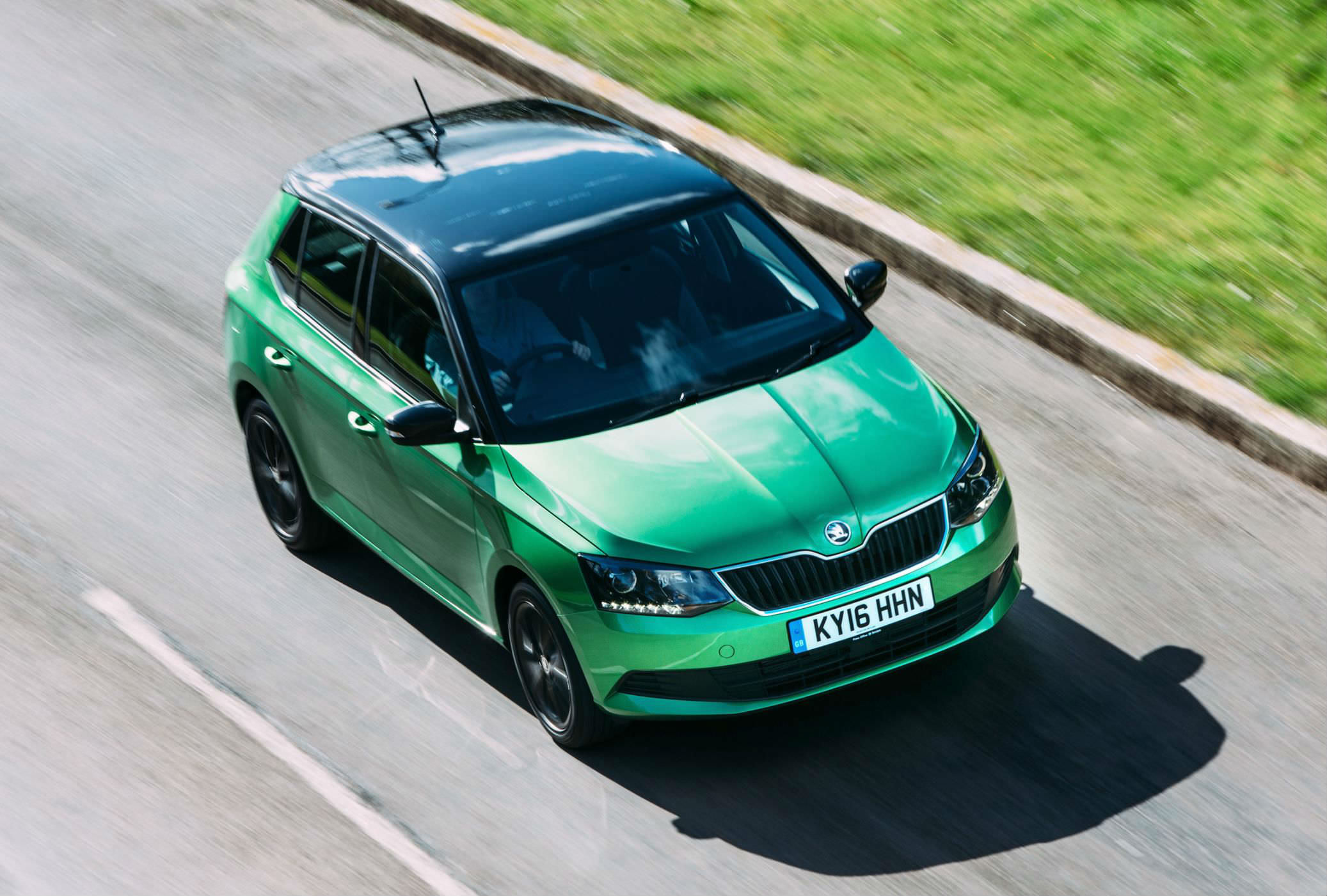 image of a green skoda fabia car exterior