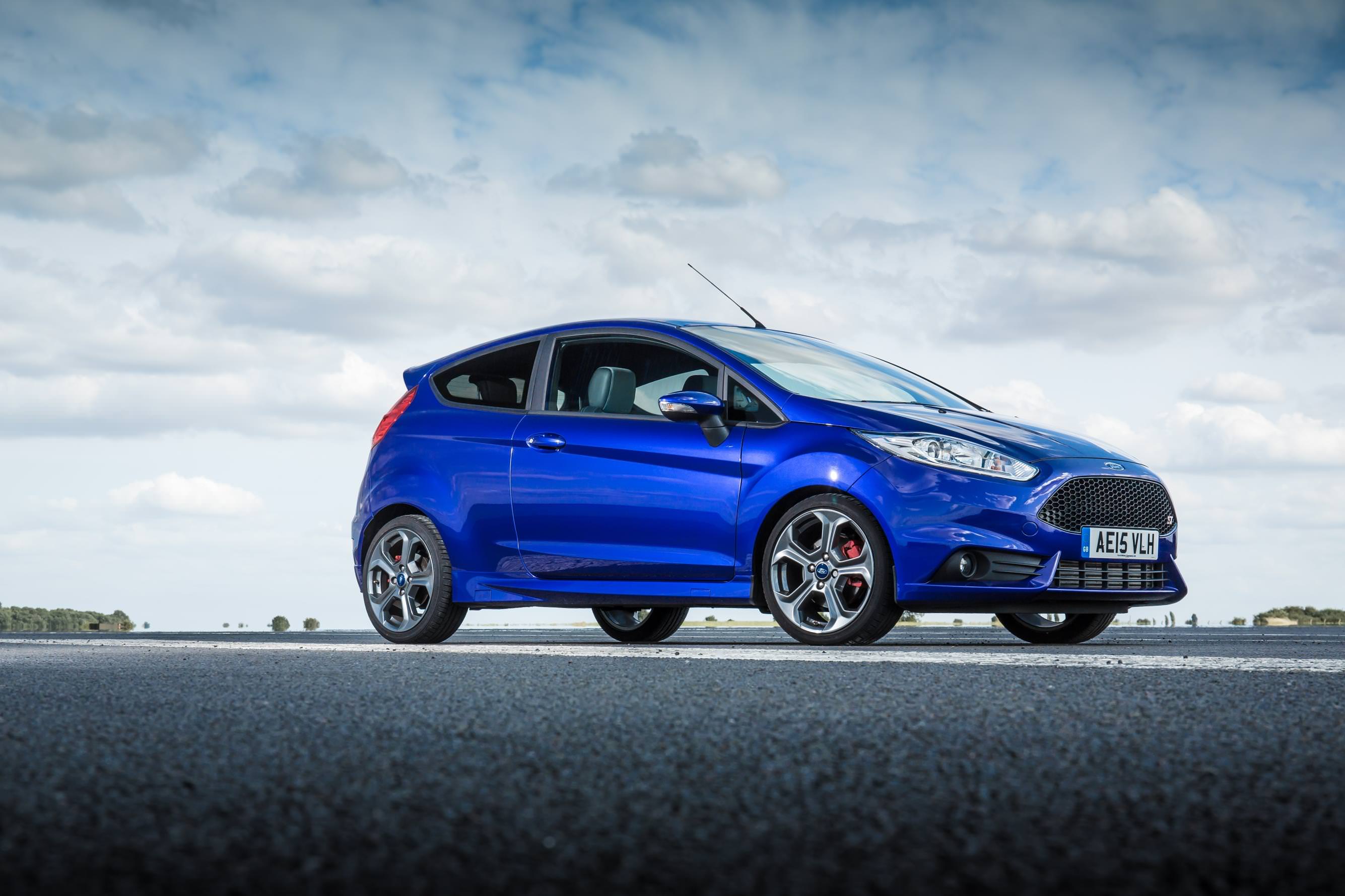 image of a blue ford fiesta st on an open road