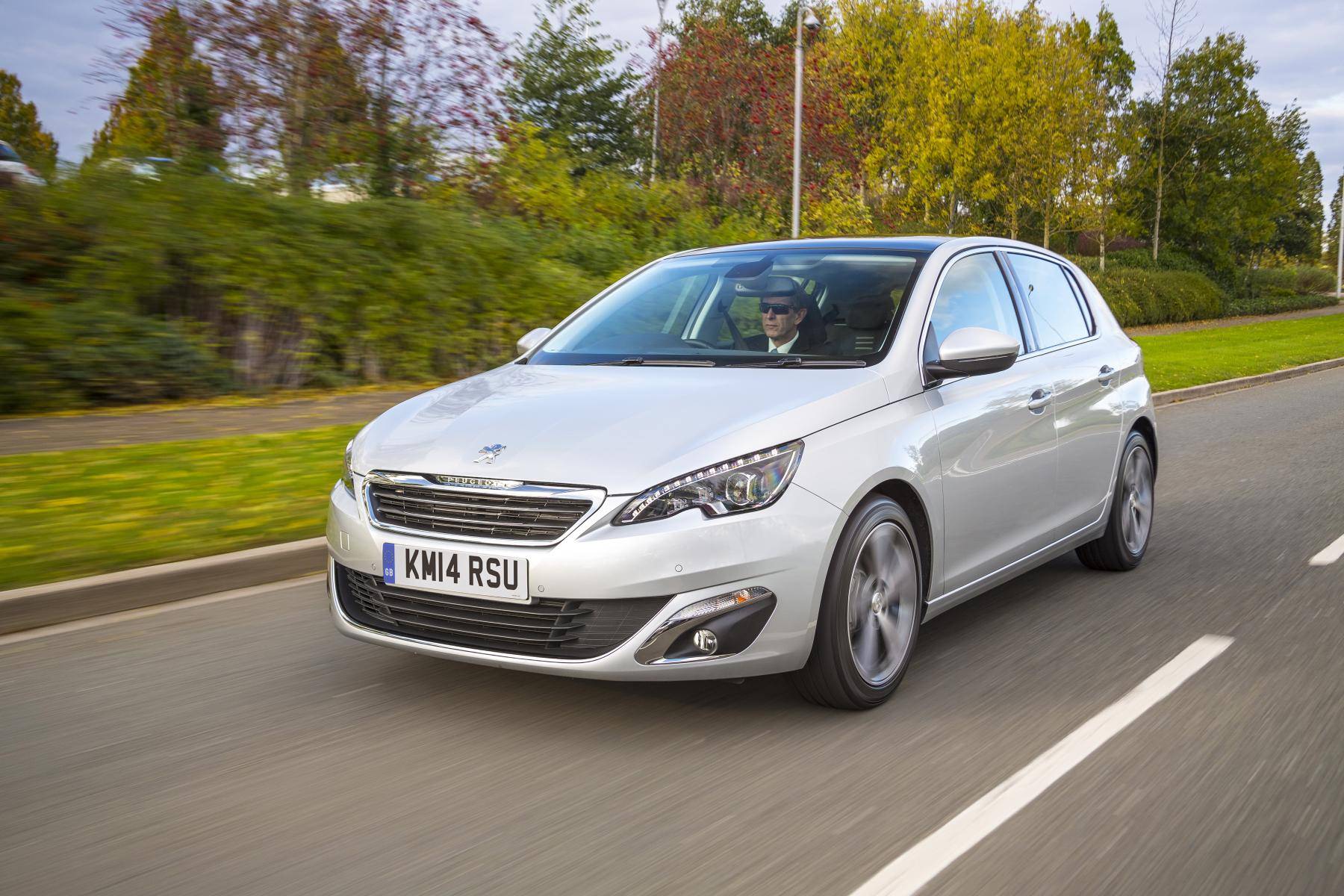 image of a silver peugeot 308 car exterior