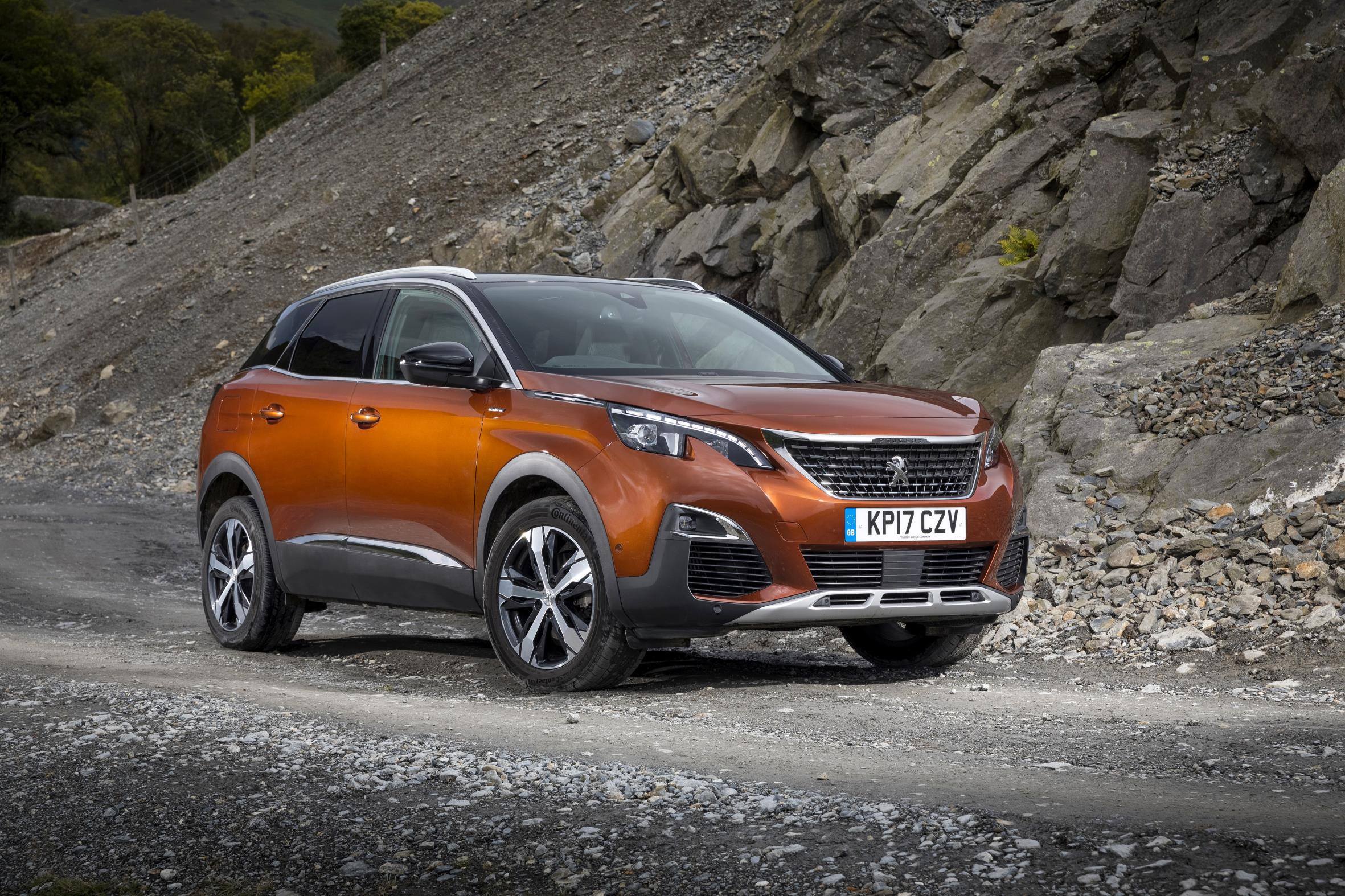 image of an orange peugeot 3008 car exterior