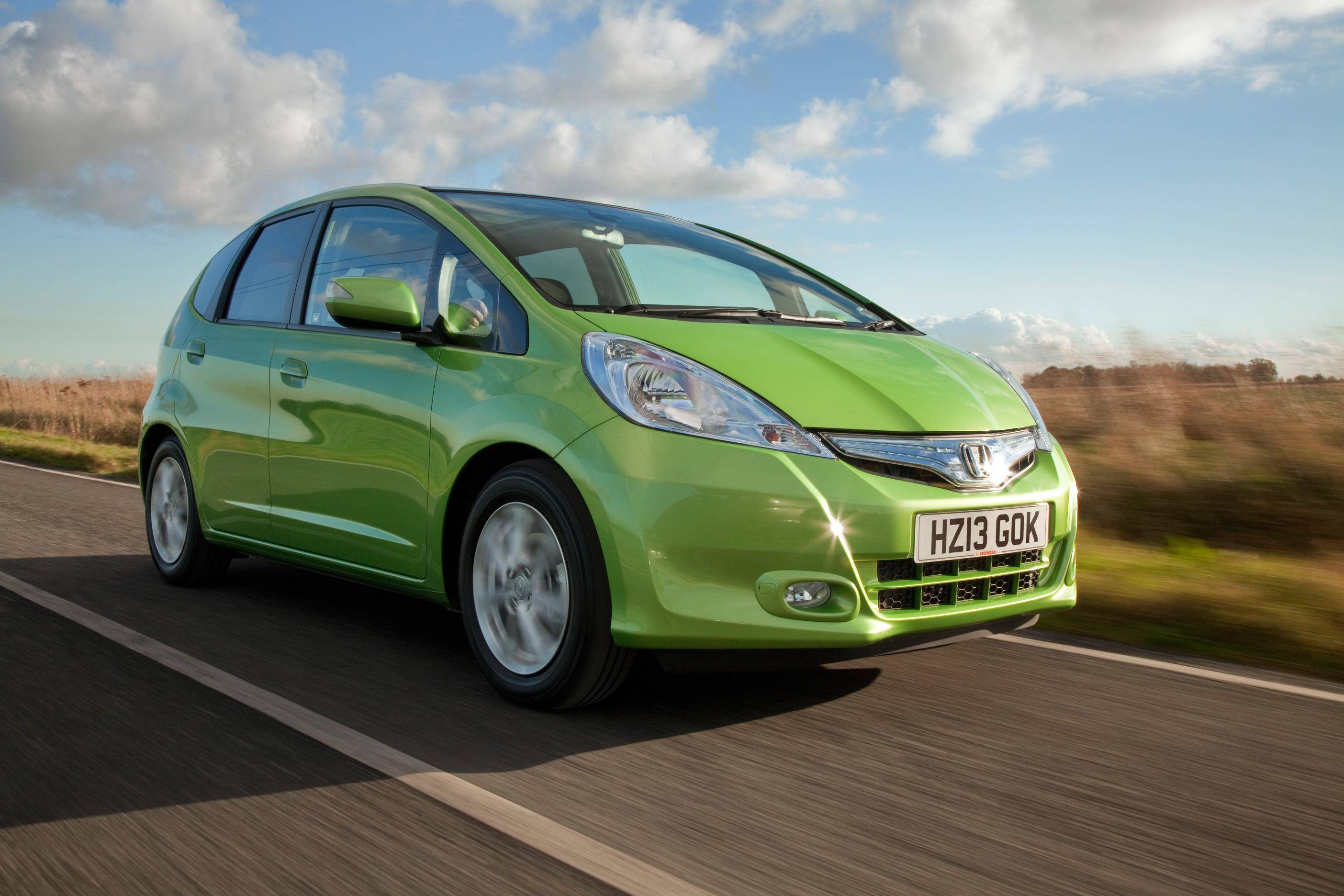 image of a green honda jazz hybrid car exterior