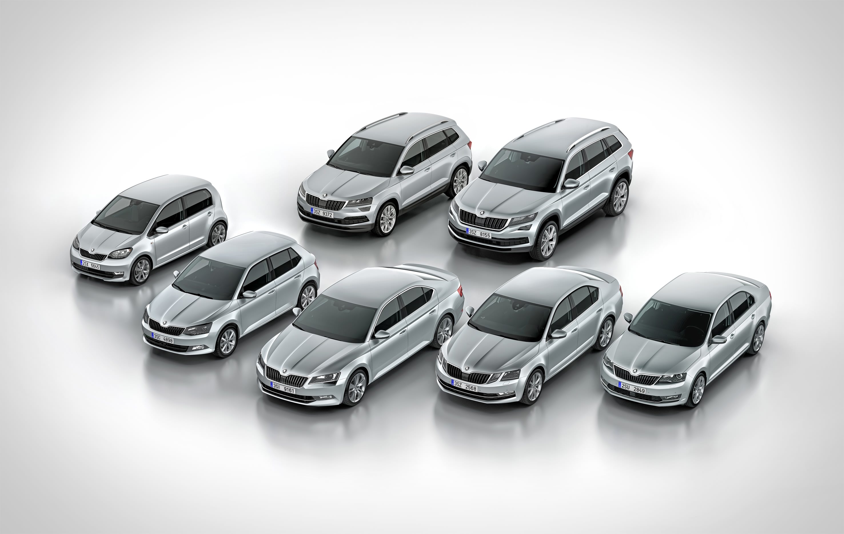 image of several various silver cars