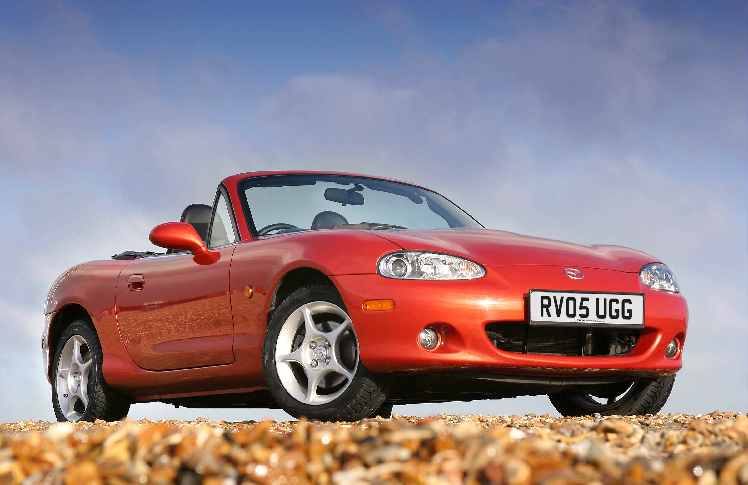 image of a red mazda mx 5 car exterior