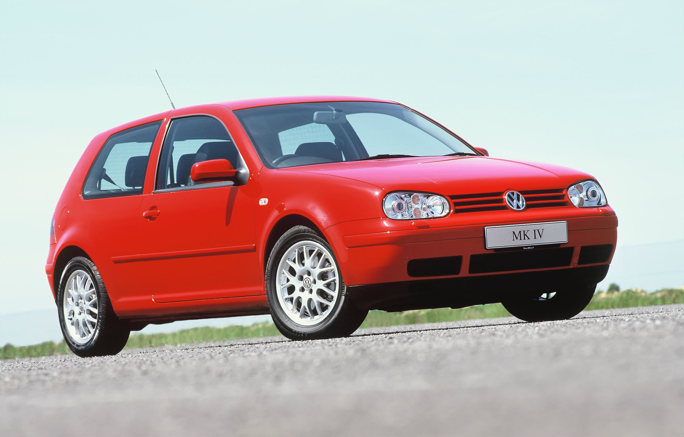 image of a red volkswagen golf gti car exterior