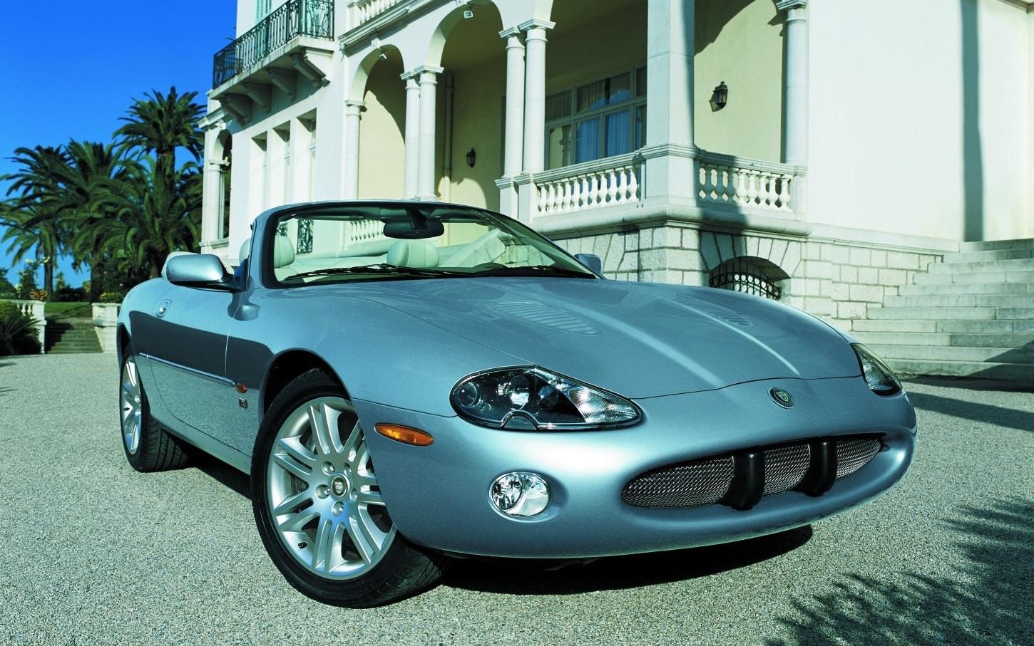 image of a blue jaguar xkr convertible car exterior