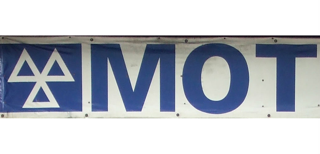 image of an mot sign in a garage