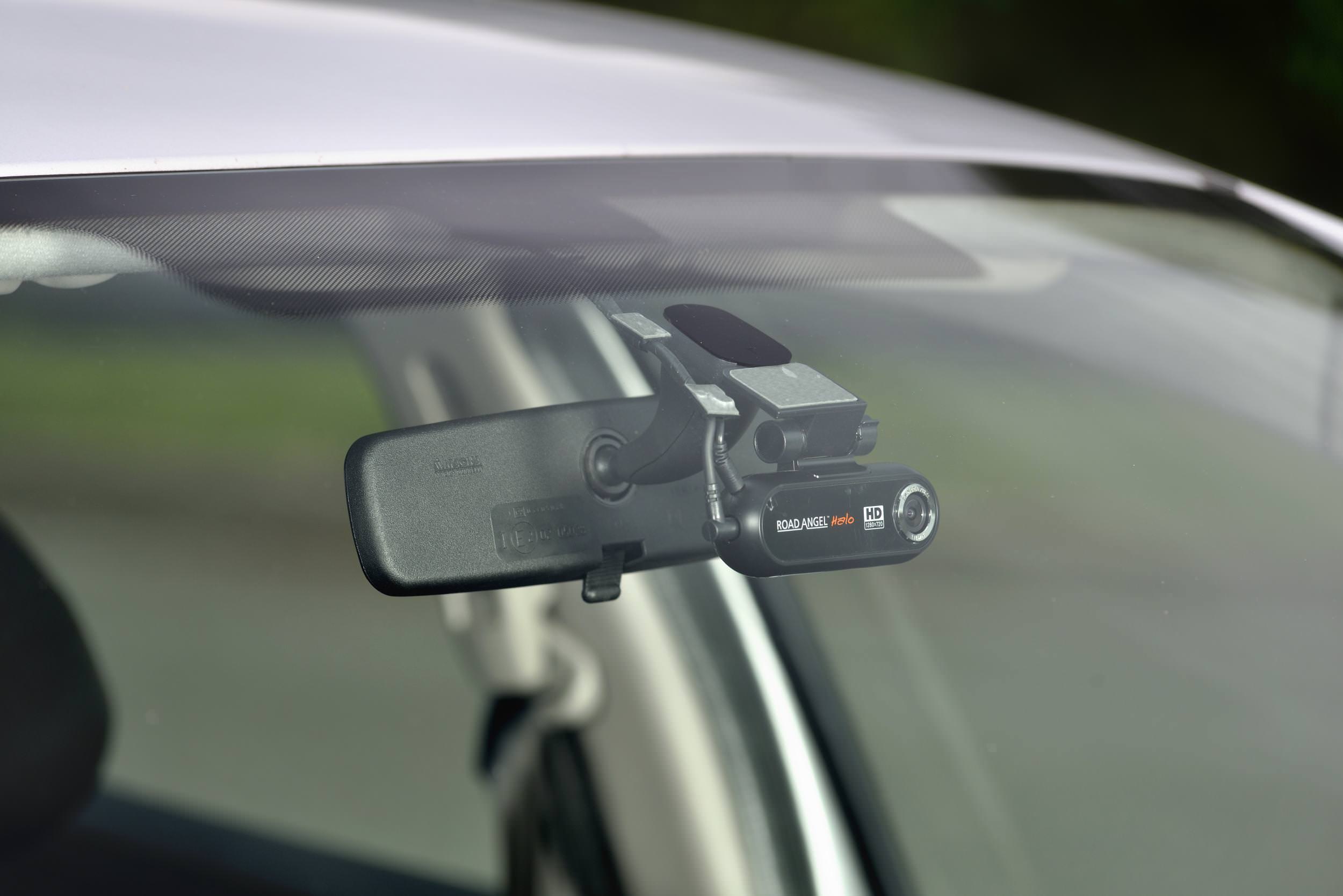 Dash Camera recording the road attached to a cars interior mirror 