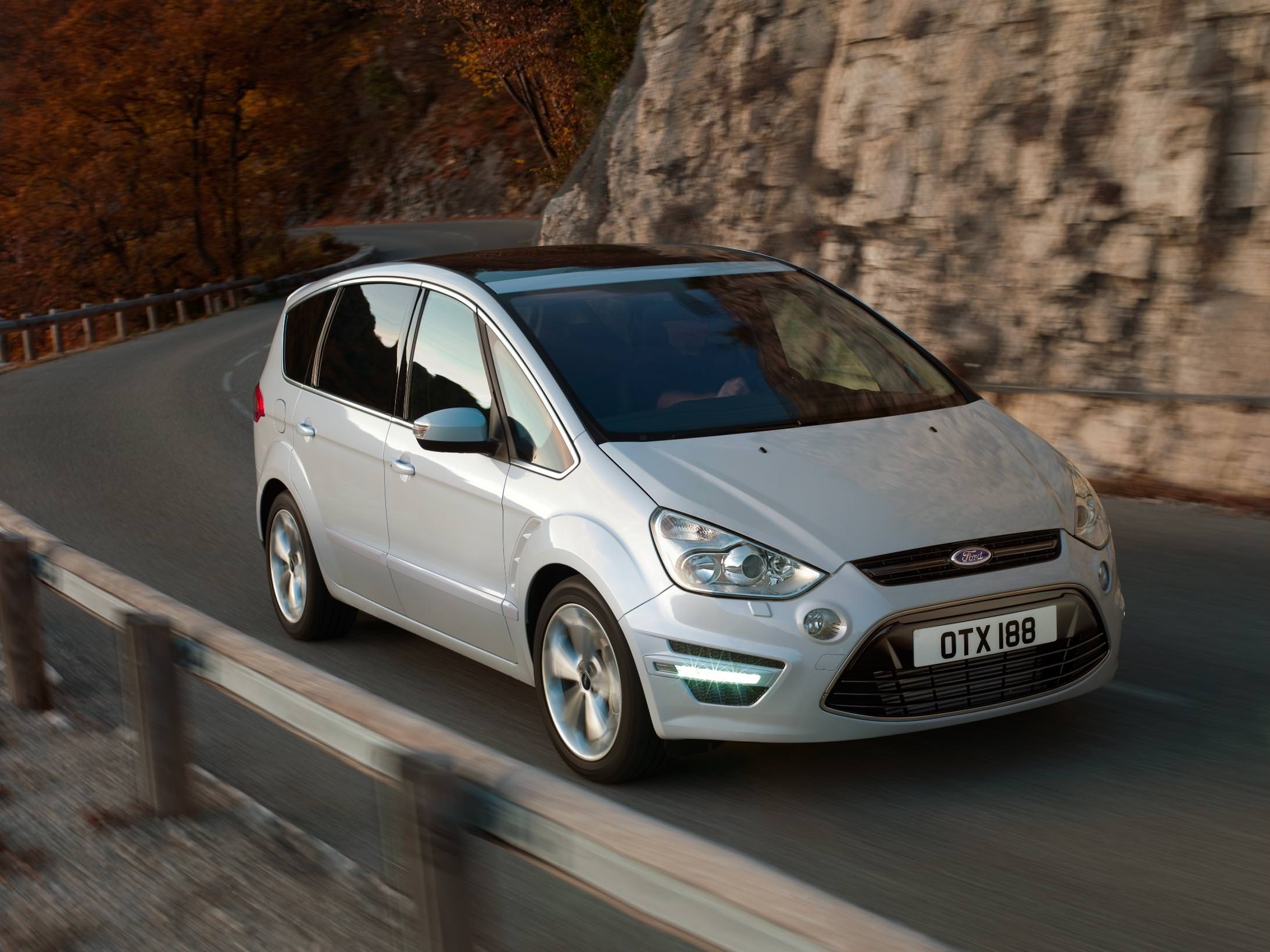 Silver Ford S-Max Driving aon mountain road